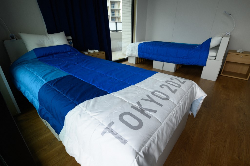 This file photo taken on June 20, 2021 shows recyclable cardboard beds and mattresses for athletes during a media tour at the Olympic and Paralympic Village for the Tokyo 2020 Games in Tokyo. - For athletes competing at the Tokyo Games, the Olympic Village will be almost all they see, with strict coronavirus rules preventing them from leaving the compound except to train and compete. 