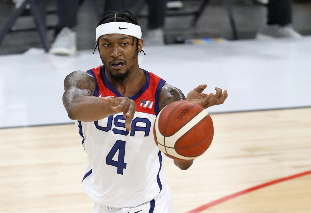 (FILES) In this file photo Bradley Beal #4 of the United States passes against Nigeria during an exhibition game at Michelob ULTRA Arena ahead of the Tokyo Olympic Games on July 10, 2021 in Las Vegas, Nevada. - NBA guard Bradley Beal will not play for the US Olympic basketball team in Tokyo while forward Jerami Grant has joined him in Covid-19 protocols, USA Basketball announced on July 15, 2021. A roster replacement for Beal will be named later, likely from a squad of NBA players who have worked with the Olympic squad during a Las Vegas training camp the past 10 days. (Photo by Ethan Miller / GETTY IMAGES NORTH AMERICA / AFP)