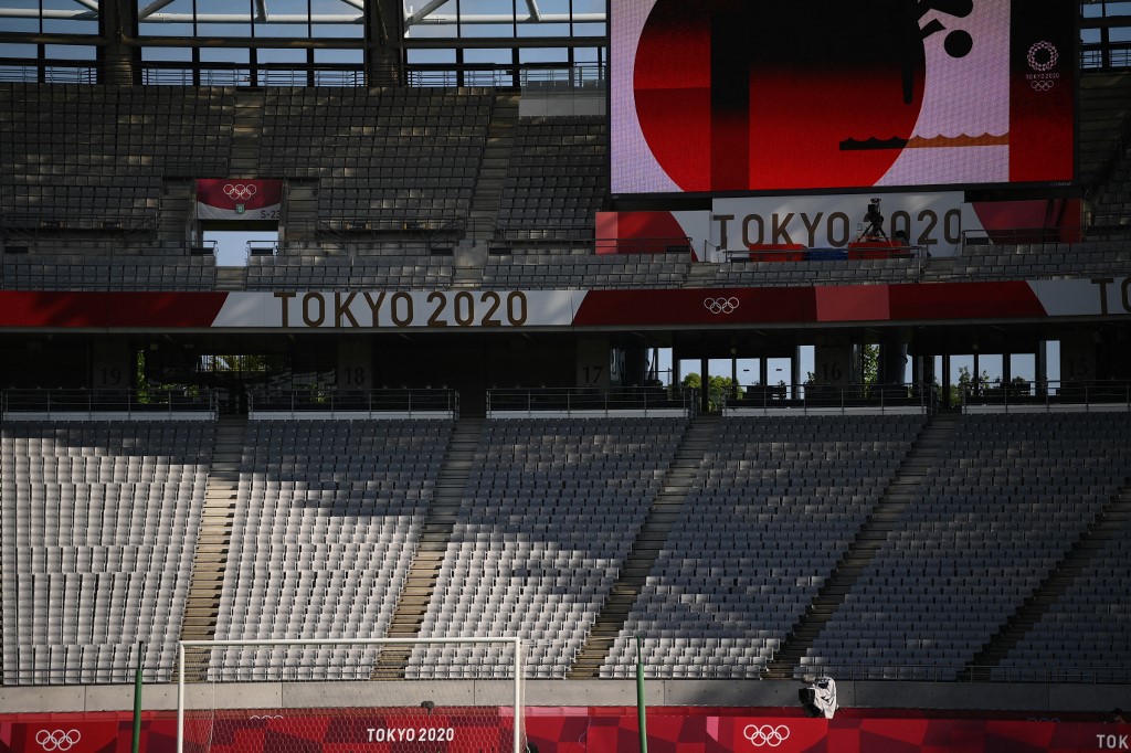 Grandstands remain empty before the start of the Tokyo 2020 Olympic Games men's group A first round football match between Mexico and France at Tokyo Stadium in Tokyo on July 22, 2021.
