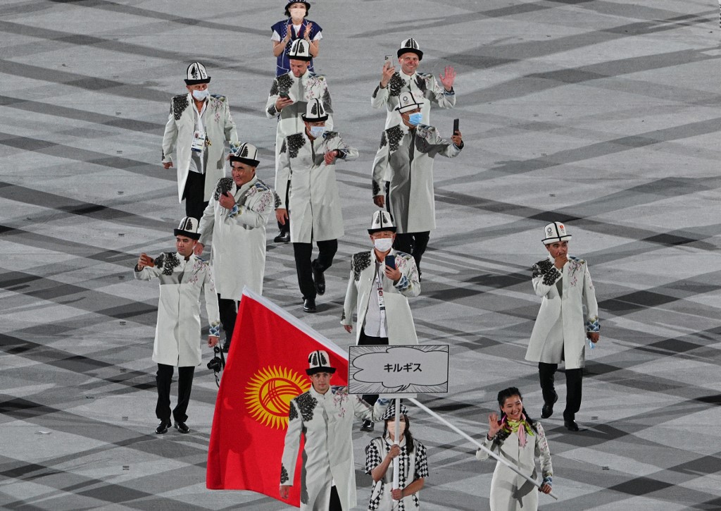 Kyrgyzstan's delegation parade during the opening ceremony of the Tokyo 2020 Olympic Games, at the Olympic Stadium, in Tokyo, on July 23, 2021. 