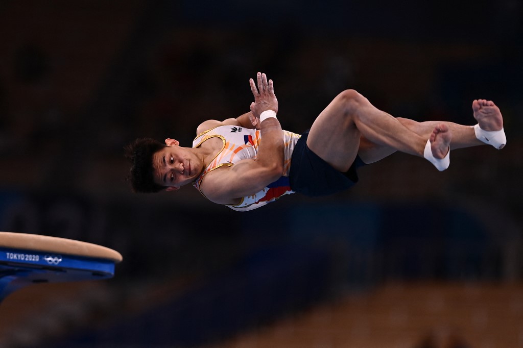 Philippines' Carlos Edriel Yulo competes in the vault event of the artistic gymnastics men's qualification during the Tokyo 2020 Olympic Games at the Ariake Gymnastics Centre in Tokyo on July 24, 2021