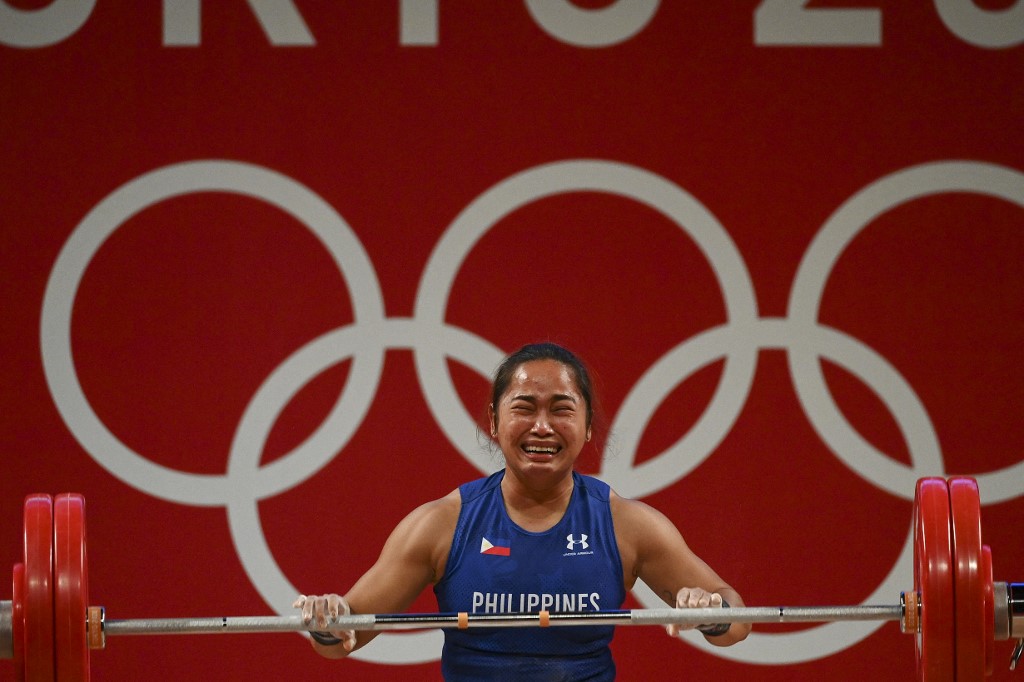 Philippines' Hidilyn Diaz competes in the women's 55kg weightlifting competition during the Tokyo 2020 Olympic Games at the Tokyo International Forum in Tokyo on July 26, 2021. 