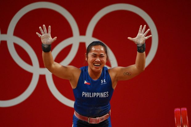 The Senate honored weightlifter Hidilyn Diaz for uplifting the nation to “great heights of joy” by winning a gold in the Olympics.
