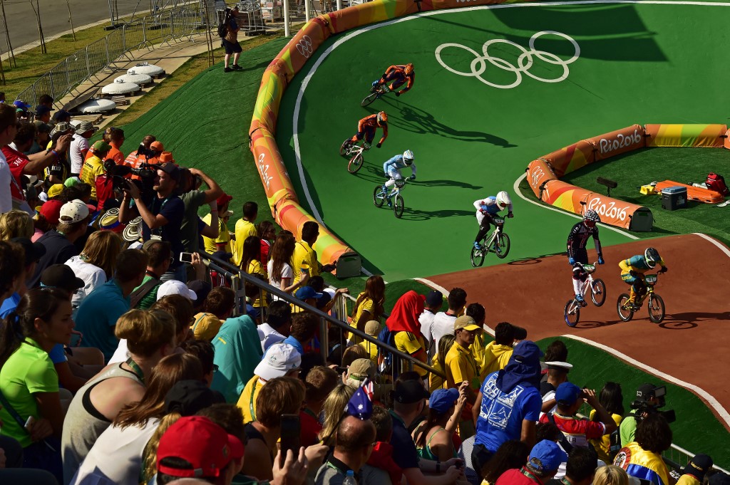 Riders compete in the men's BMX semi final event at the Rio 2016 Olympic Games at the X Park Stadium in Rio de Janeiro on August 19, 2016.