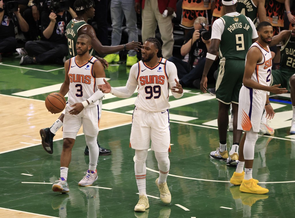 Jae Crowder #99 of the Phoenix Suns questions a call during the first half in Game Three of the NBA Finals against the Milwaukee Bucks at Fiserv Forum on July 11, 2021 in Milwaukee, Wisconsin.