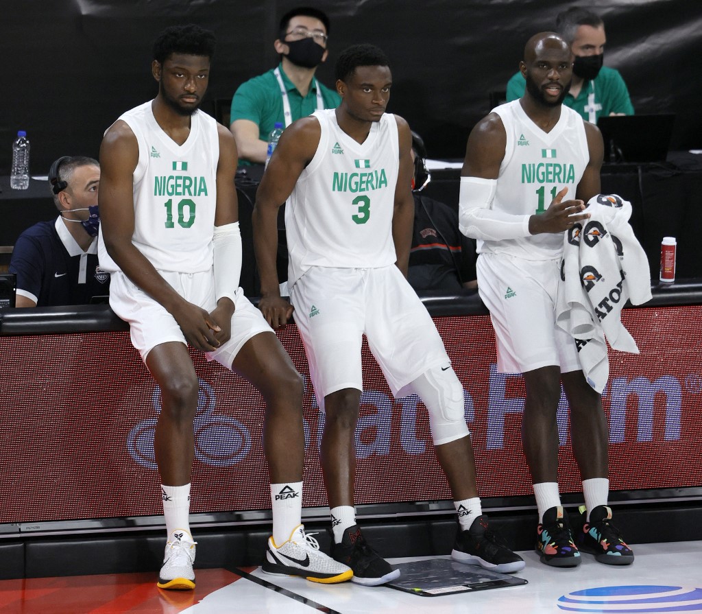 LAS VEGAS, NEVADA - JULY 12: Chimezie Metu #10, Caleb Agada #3 and Obi Emegano #11 of Nigeria wait to check in during an exhibition game against Argentina at Michelob ULTRA Arena ahead of the Tokyo Olympic Games on July 12, 2021 in Las Vegas, Nevada. Nigeria defeated Argentina 94-71.   Ethan Miller/Getty Images/AFP (Photo by Ethan Miller / GETTY IMAGES NORTH AMERICA / Getty Images via AFP)