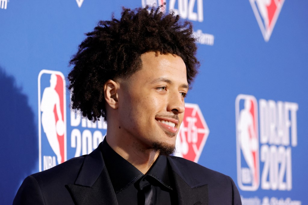 Cade Cunningham poses for photos on the red carpet during the 2021 NBA Draft at the Barclays Center on July 29, 2021 in New York City
