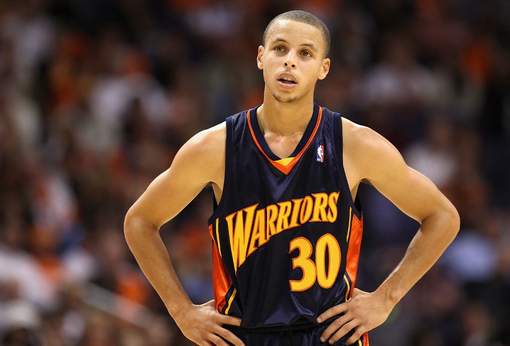 Stephen Curry #30 of the Golden State Warriors reacts during the NBA game against the Phoenix Suns during at US Airways Center on October 30, 2009 in Phoenix, Arizona.