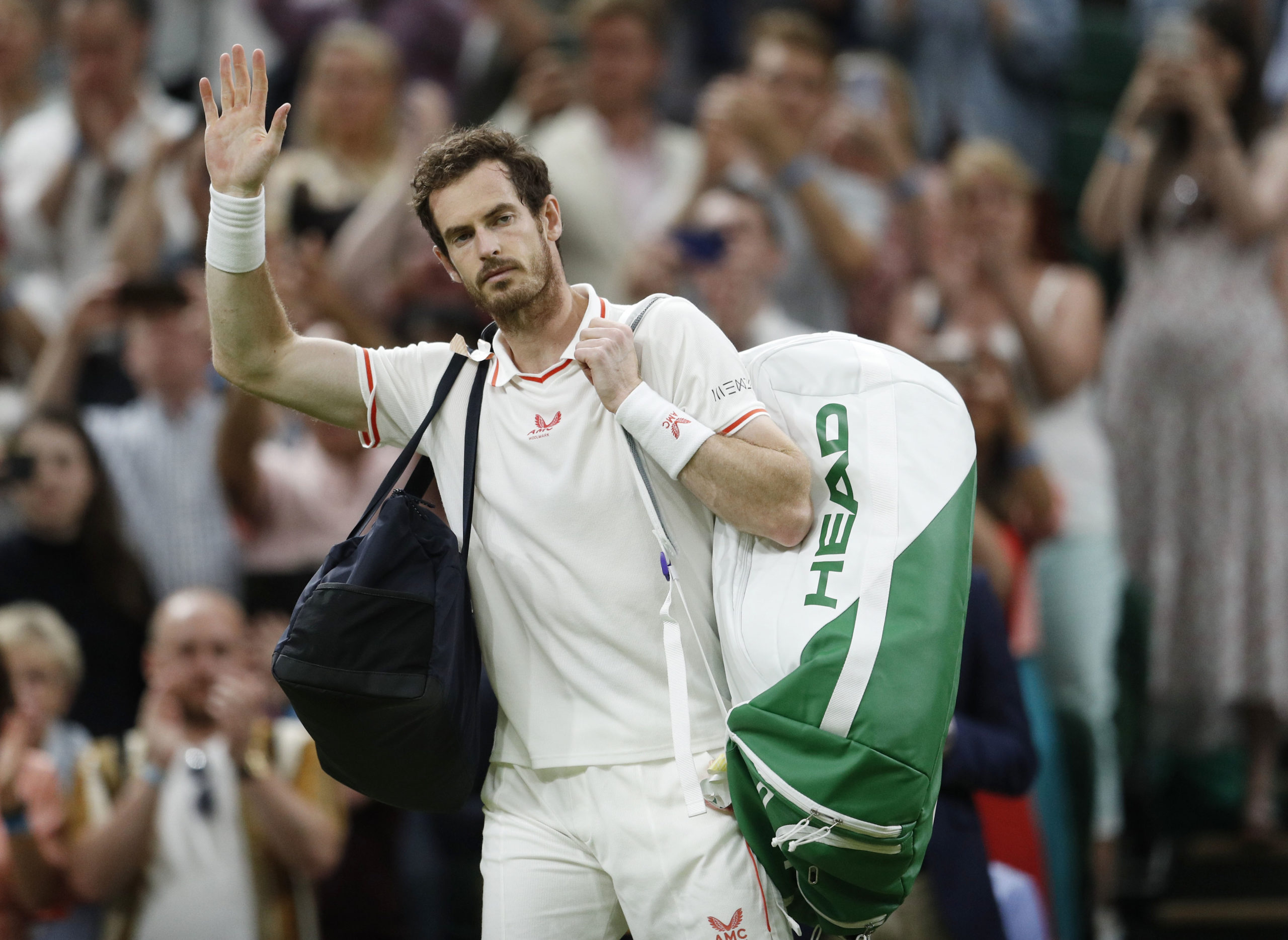 Great Britain's Andy Murray leaves court after losing his third round match against Canada's Denis Shapovalov 