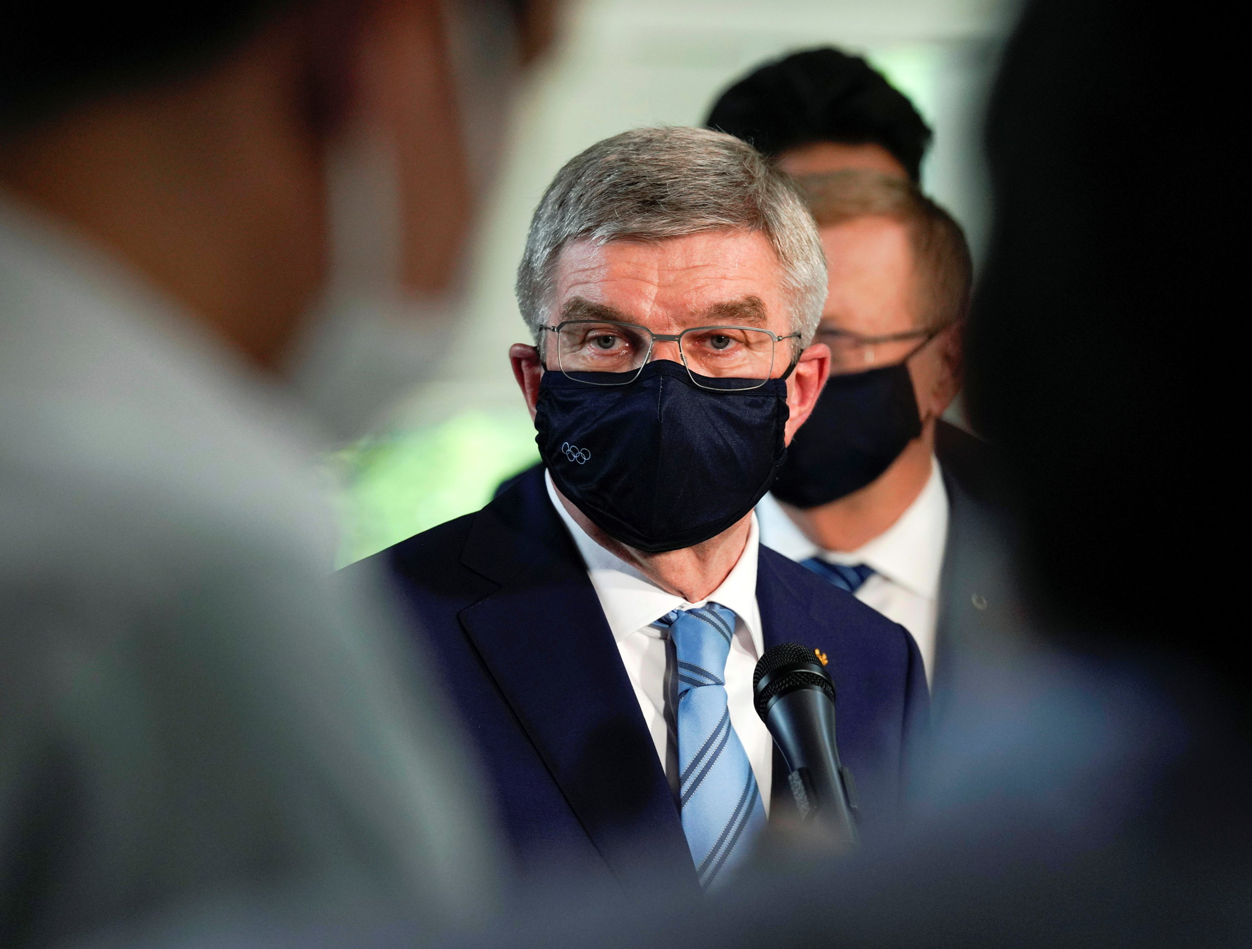 International Olympic Committee President Thomas Bach speaks to journalists after a meeting with Japanese Prime Minister Yoshihide Suga, in Tokyo, Japan, July 14, 2021. Kimimasa Mayama/Pool via REUTERS