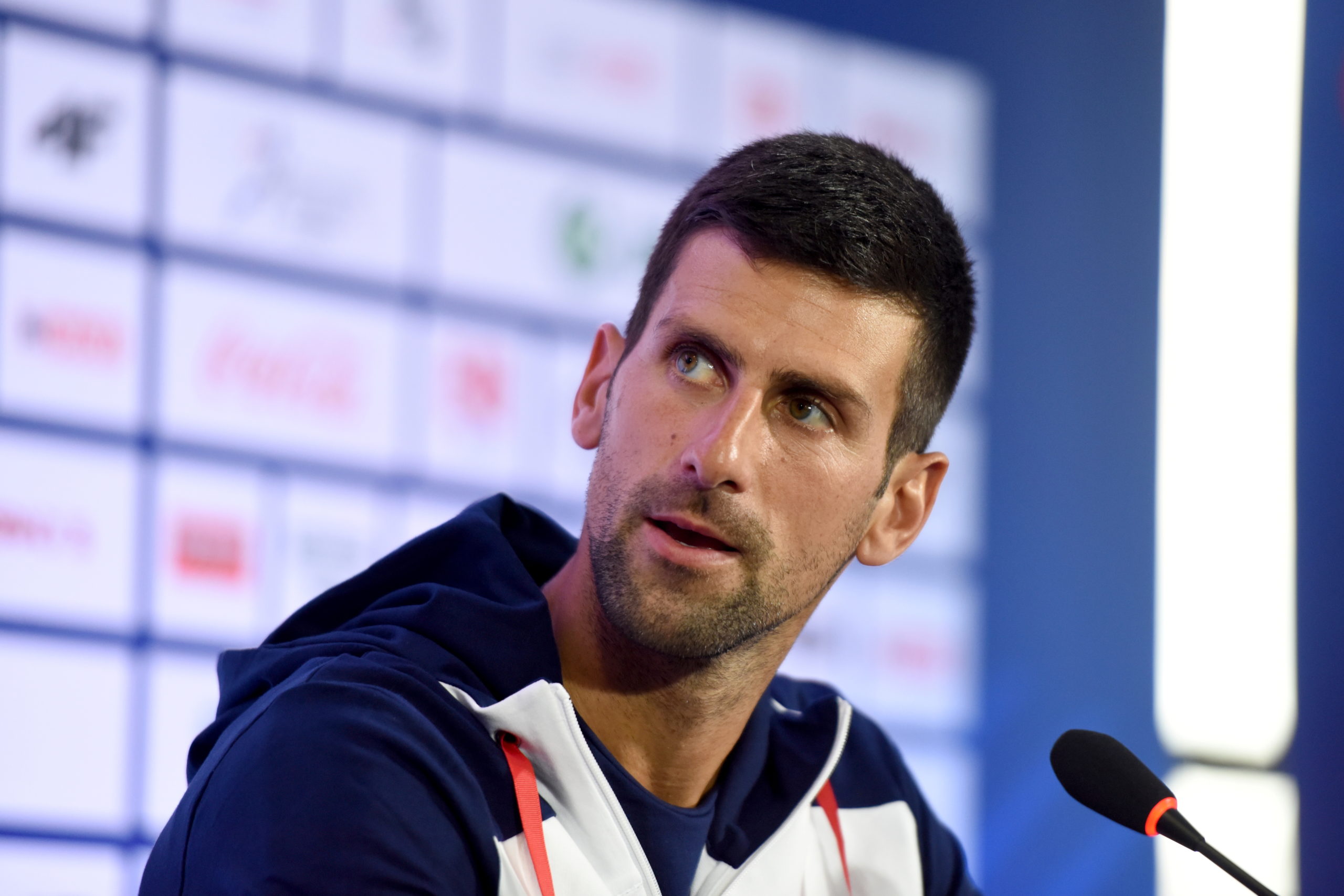 Tennis player Novak Djokovic speaks to the media before traveling to Japan where he will represent Serbia at the Tokyo 2020 Olympics, in Belgrade, Serbia, July 20, 2021. REUTERS/Zorana Jevtic