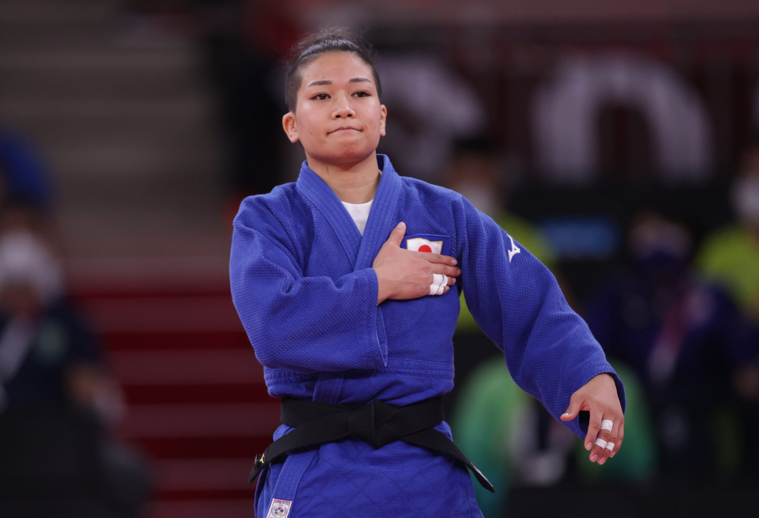 Judo -  Women's 48kg - Semifinal - Nippon Budokan - Tokyo, Japan - July 24, 2021. Funa Tonaki of Japan reacts 