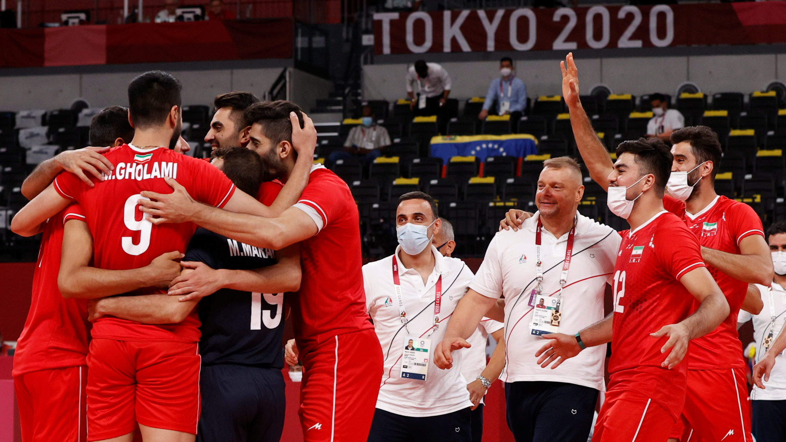 Tokyo 2020 Olympics - Volleyball - Men's Pool A - Iran v Venezuela - Ariake Arena, Tokyo, Japan – July 26, 2021. Team members of Iran celebrate after the match. 