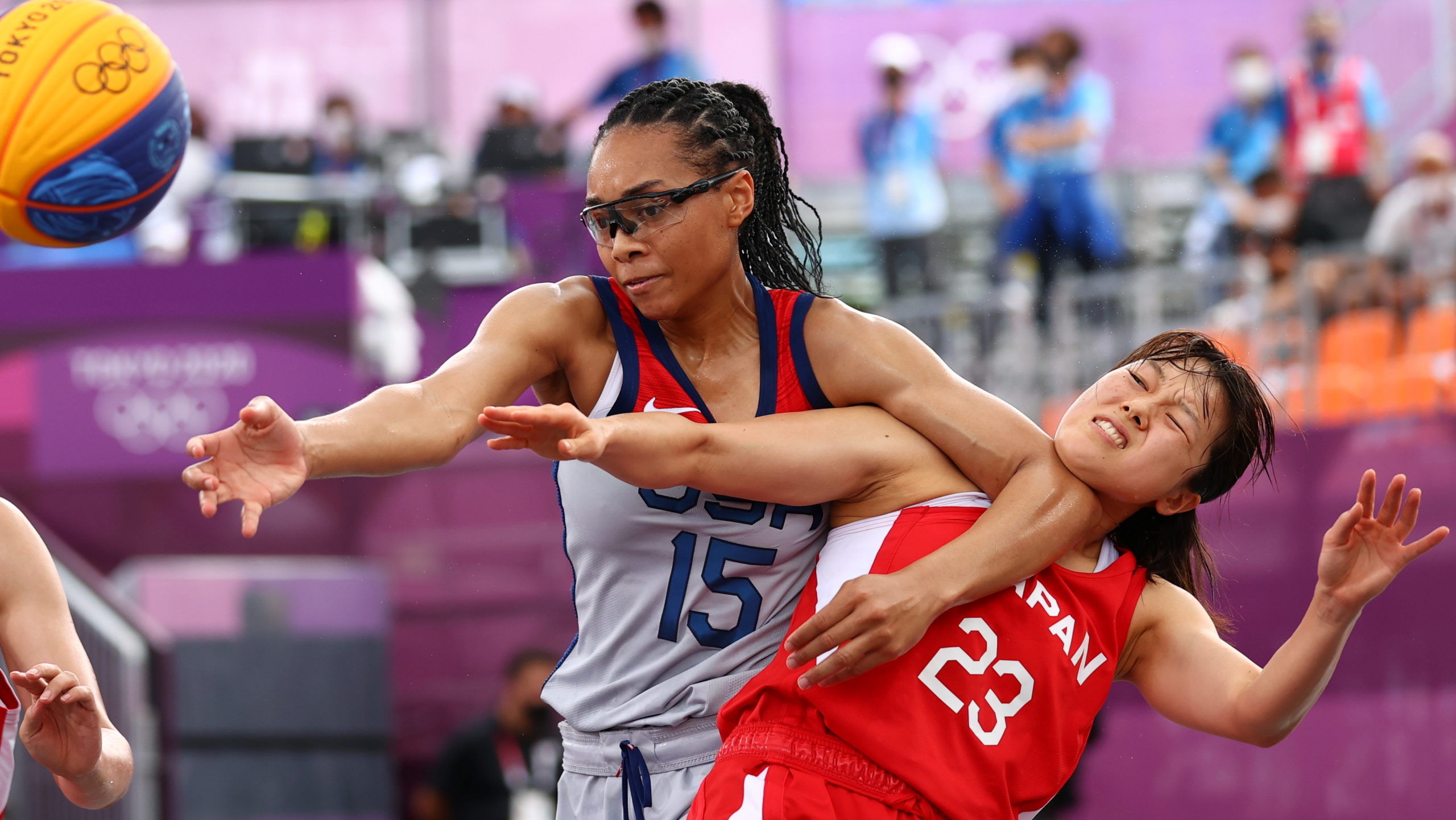 Tokyo 2020 Olympics - Basketball 3x3 - Women - Pool A - United States v Japan - Aomi Urban Sports Park, Tokyo, Japan - July 27, 2021. Allisha Gray of the United States in action with Risa Nishioka of Japan and Mai Yamamoto of Japan during a match. 