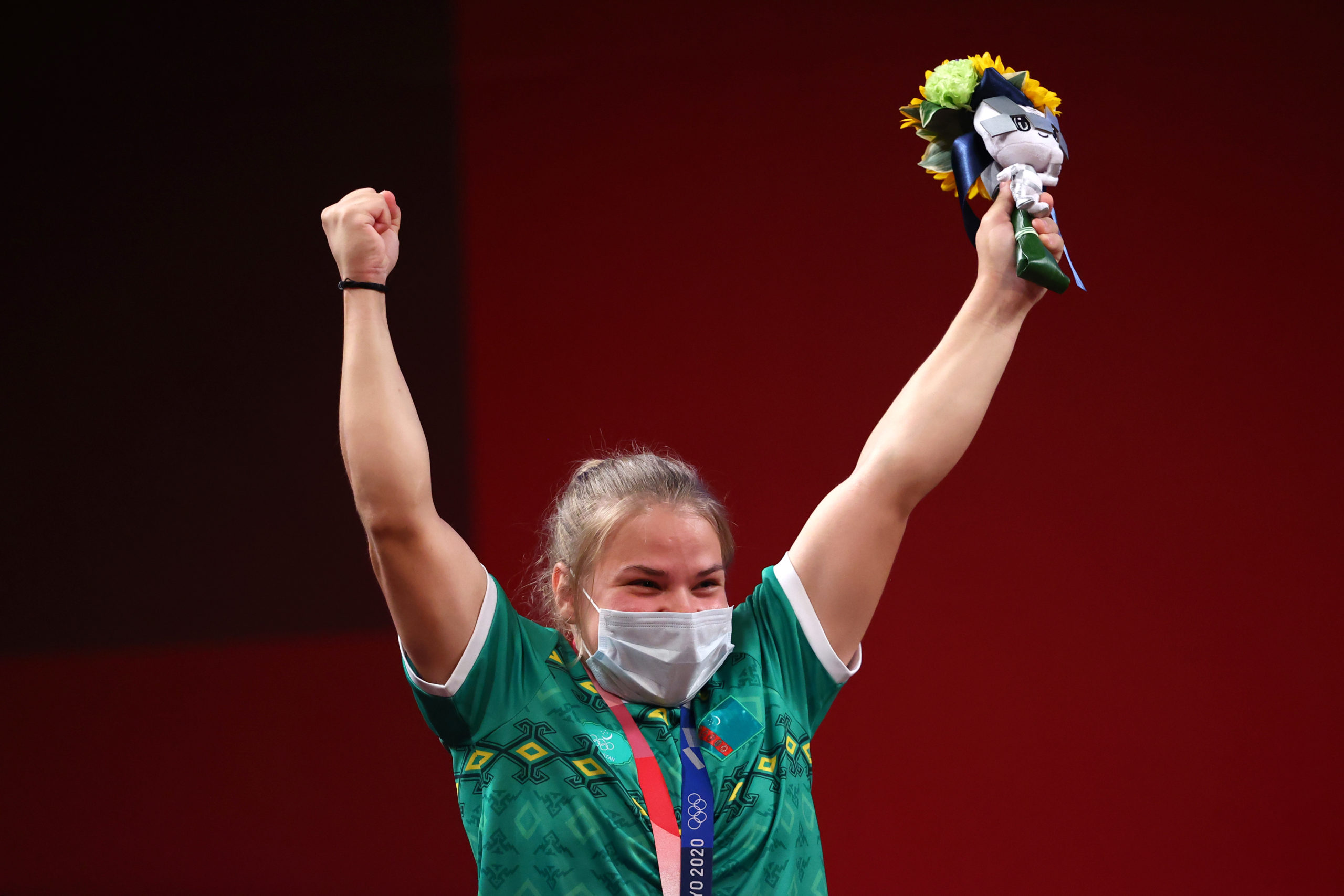 Olympics - Weightlifting - Women's 59kg - Medal Ceremony - Tokyo International Forum, Tokyo, Japan - July 27, 2021. Silver medalist Polina Guryeva of Turkmenistan reacts.
