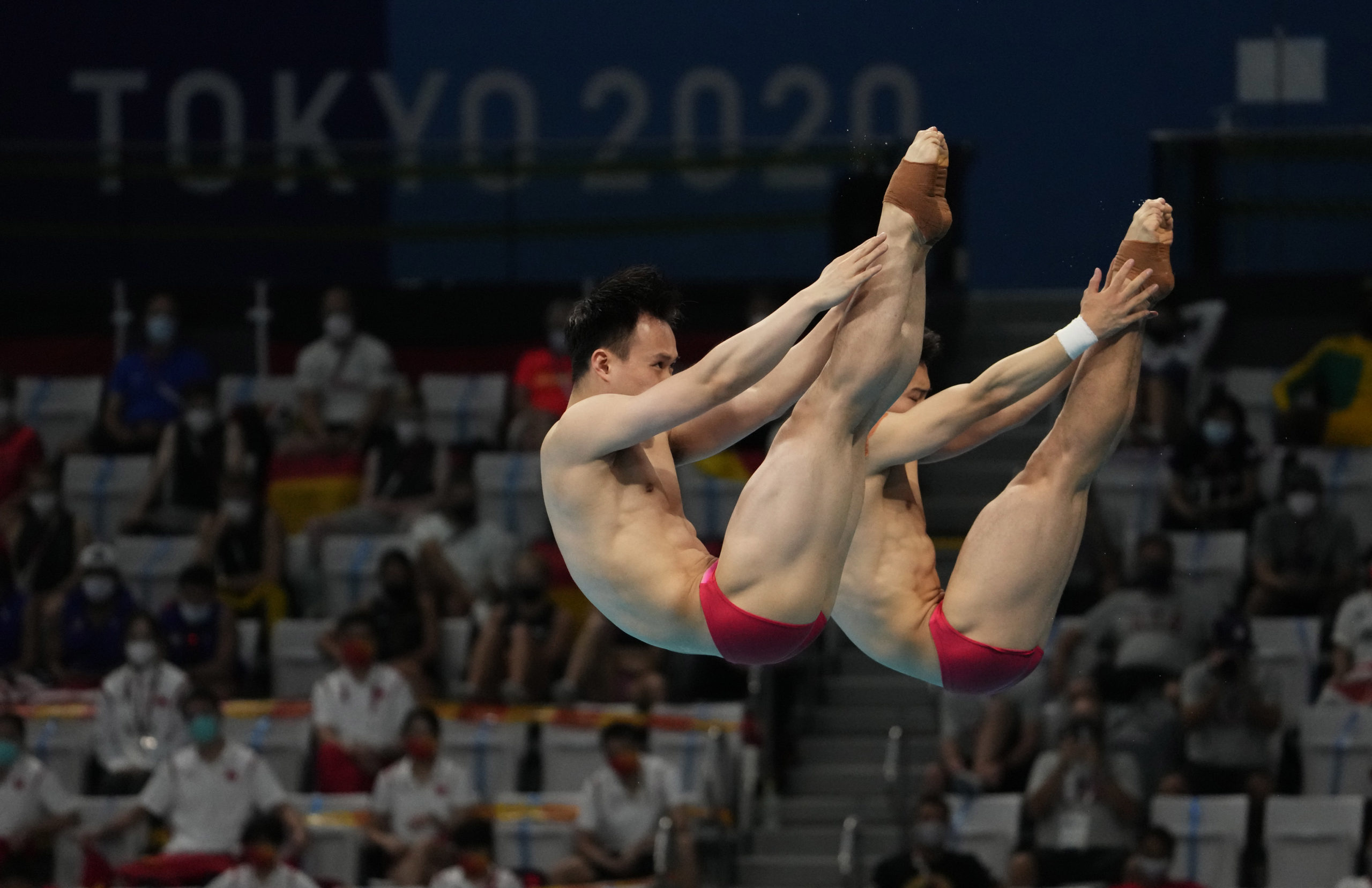 Wang Zongyuan and Xie Siyi (CHN) in the men's 3m springboard synchronized diving during the Tokyo 2020 Olympic Summer Games at Tokyo Aquatics Centre.