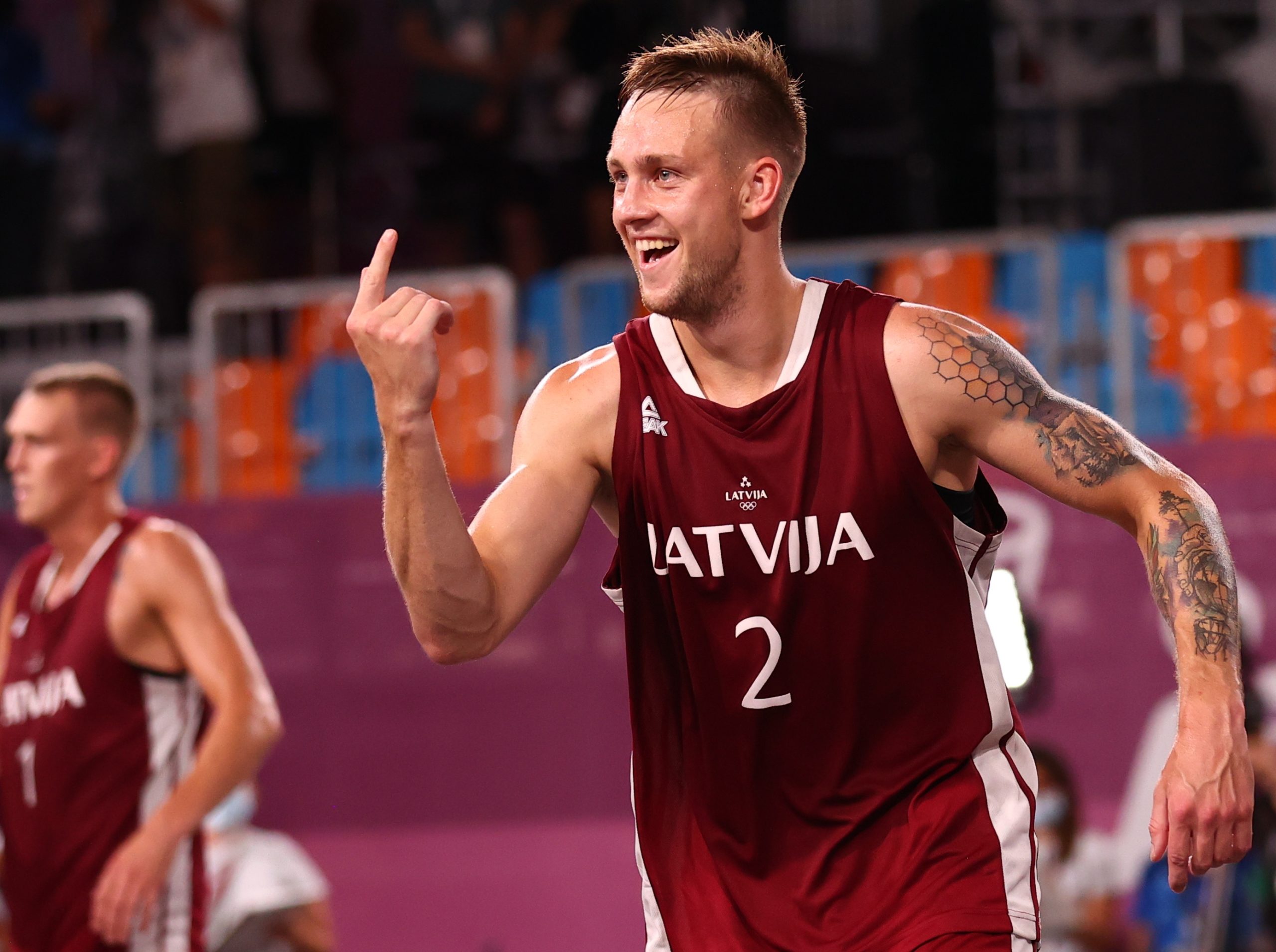 Karlis Lasmanis of Latviaa celebrates victory after the match.