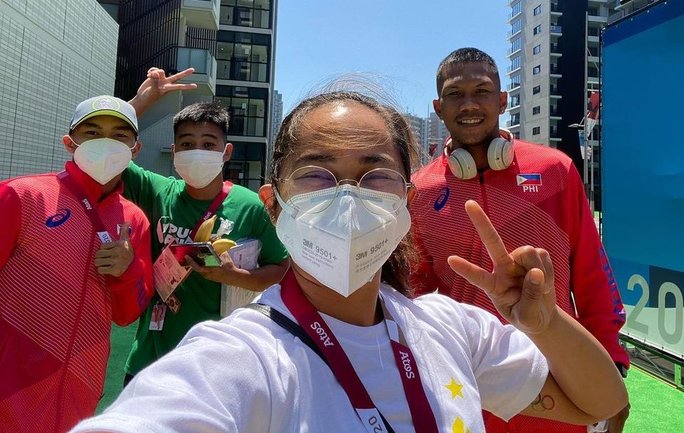 Weightlifter Hidilyn Diaz with boxers Carlo Paalam, Nesthy Petecio and Eumir Marcial inside the Olympic Village in Tokyo