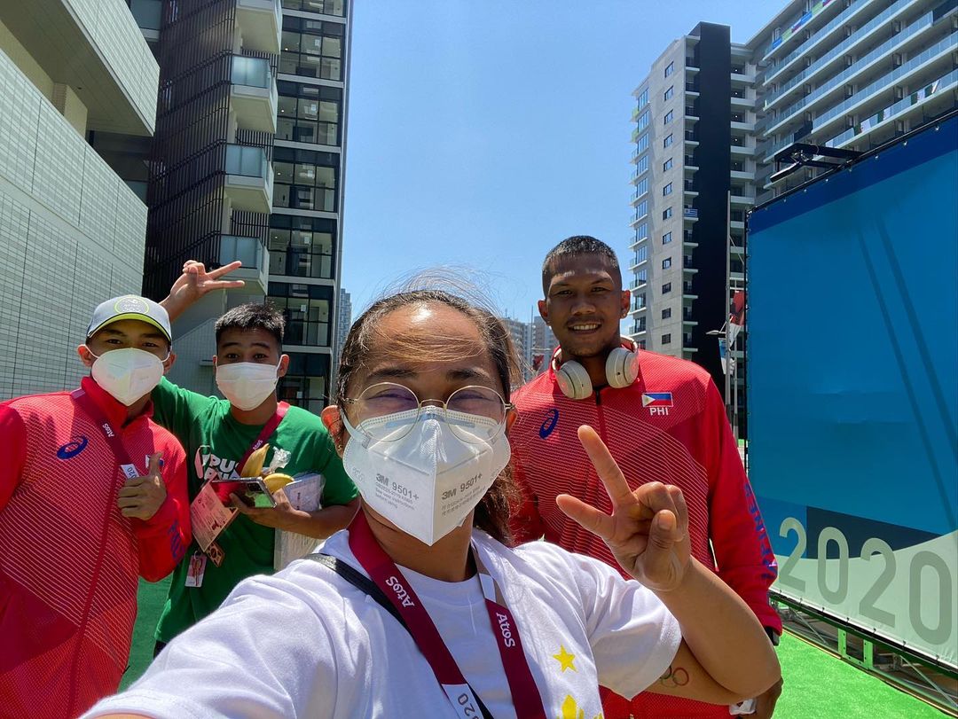 Weightlifter Hidilyn Diaz with boxers Carlo Paalam, Nesthy Petecio and Eumir Marcial inside the Olympic Village in Tokyo