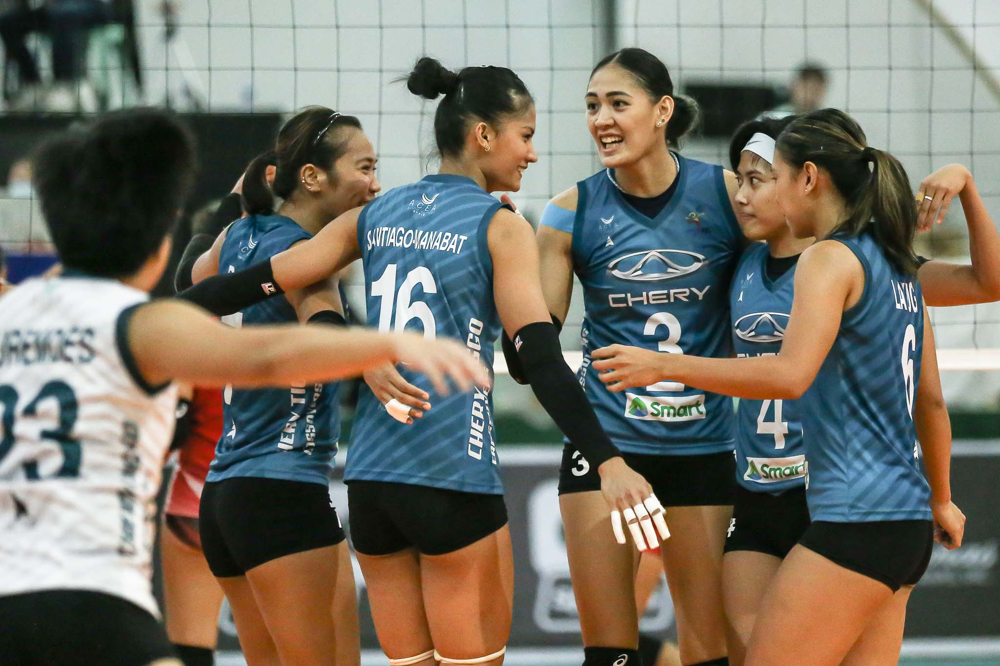 Chery Tiggo players in a huddle during a PVL game