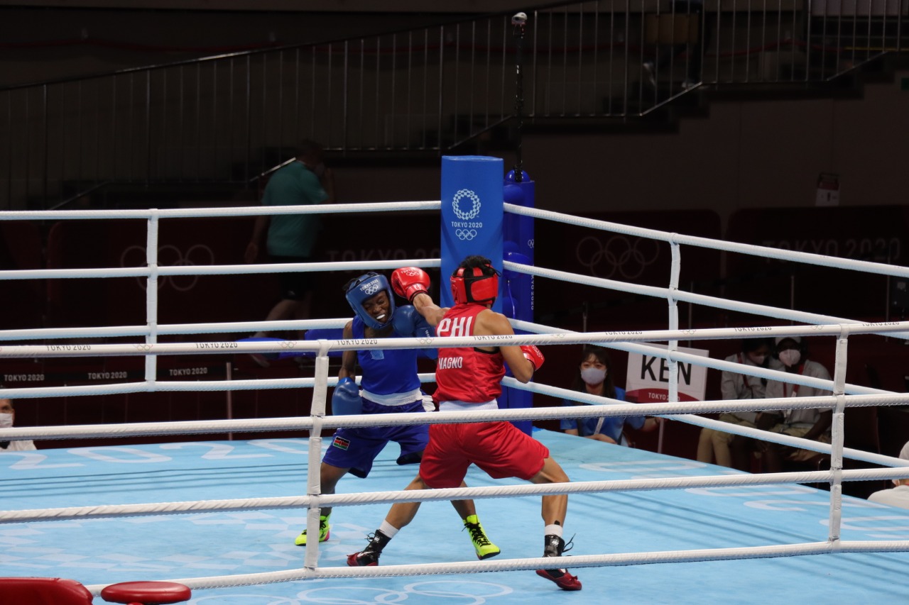 Philippines' Irish Magno vs Kenya's Christine Christine Ongare in the round of 32 match of the Tokyo Olympics boxing event