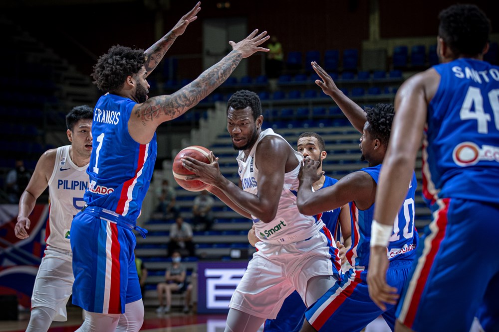 Angelo Koaume vs Dominican Republic defenders in a Fiba Olympic Qualifying Game