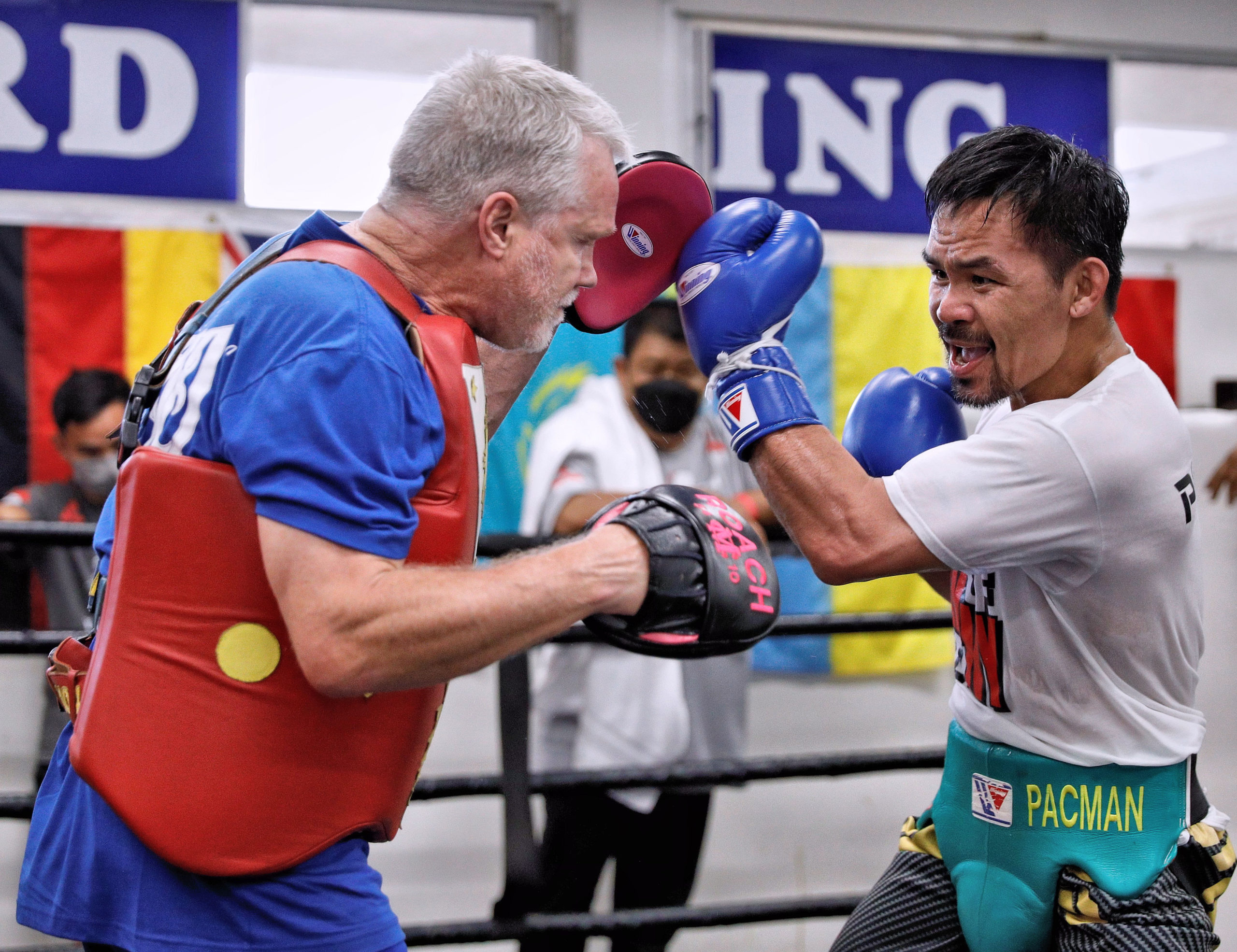 Filipino boxing champion Manny Pacquiao and trainer Freddie Roach. 