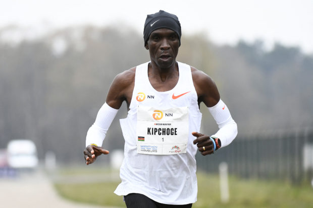 Kenya's Eliud Kipchoge competes during the "Hamburg Marathon" taking place at the Twente airport in Enschede, the Netherlands on April 18, 2021 as part of the qualification for the rescheduled Olympic Games in Tokyo.