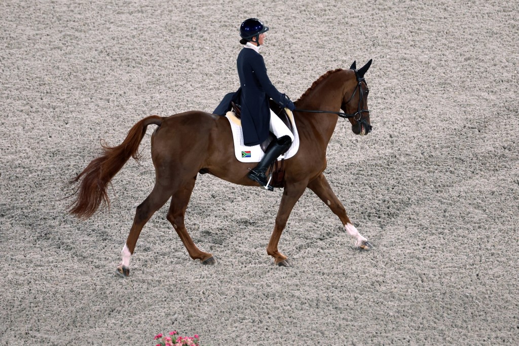 South Africa's Victoria Scott-Legendre riding Valtho des Peupliers competes in the equestrian's eventing individual dressage during the Tokyo 2020 Olympic Games at the Equestrian Park in Tokyo on July 30, 2021.