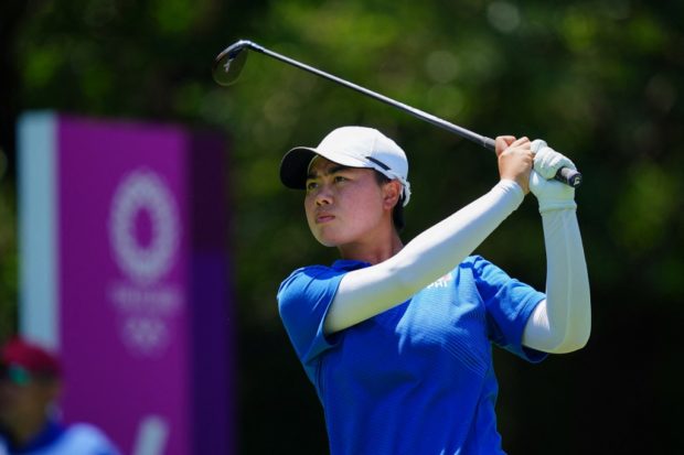Philippines' Yuka Saso watches her drive from the 4th tee in round 2 of the women’s golf individual stroke play during the Tokyo 2020 Olympic Games at the Kasumigaseki Country Club in Kawagoe on August 5, 2021.
