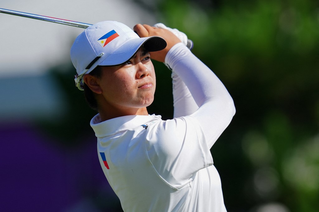 Philippines' Yuka Saso watches her drive from the 10th tee in round 3 of the womens golf individual stroke play during the Tokyo 2020 Olympic Games at the Kasumigaseki Country Club in Kawagoe on August 6, 2021.