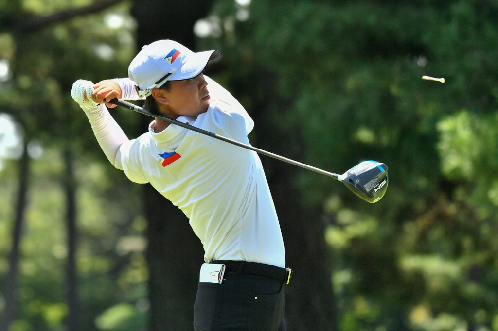 Philippines' Yuka Saso watches her drive from the 9th tee in round 3 of the women’s golf individual stroke play during the Tokyo 2020 Olympic Games at the Kasumigaseki Country Club in Kawagoe on August 6, 2021.