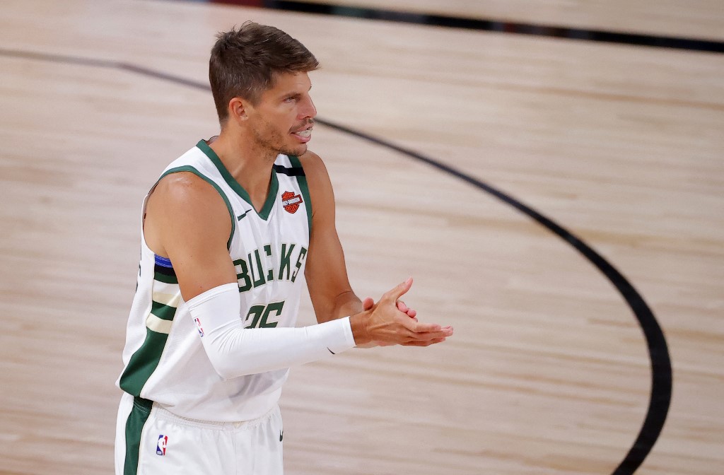 Kyle Korver #26 of the Milwaukee Bucks reacts after shooting a three point basket against the Orlando Magic during the second quarter in Game Five of the Eastern Conference First Round during the 2020 NBA Playoffs at AdventHealth Arena at ESPN Wide World Of Sports Complex on August 29, 2020 in Lake Buena Vista, Florida.