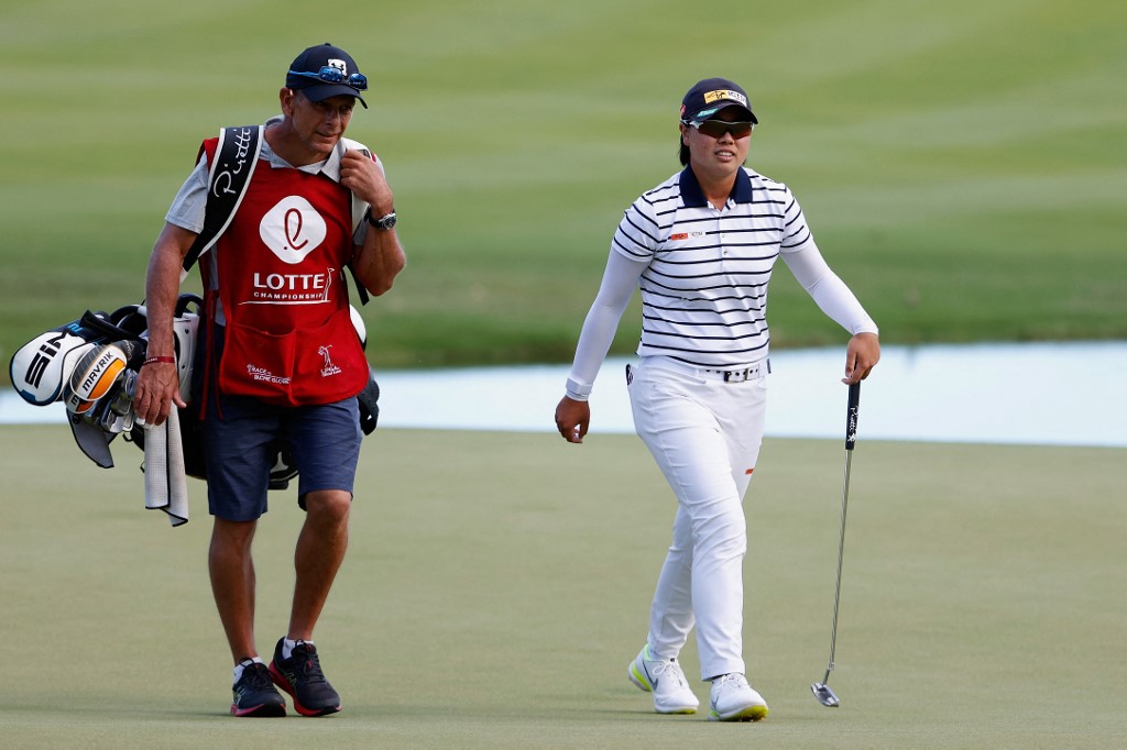 FILE -- Yuka Saso of the Philippines walks up to the 18th green with her caddie during the final round of the LPGA LOTTE Championship at Kapolei Golf Club on April 17, 2021 in Kapolei, Hawaii.