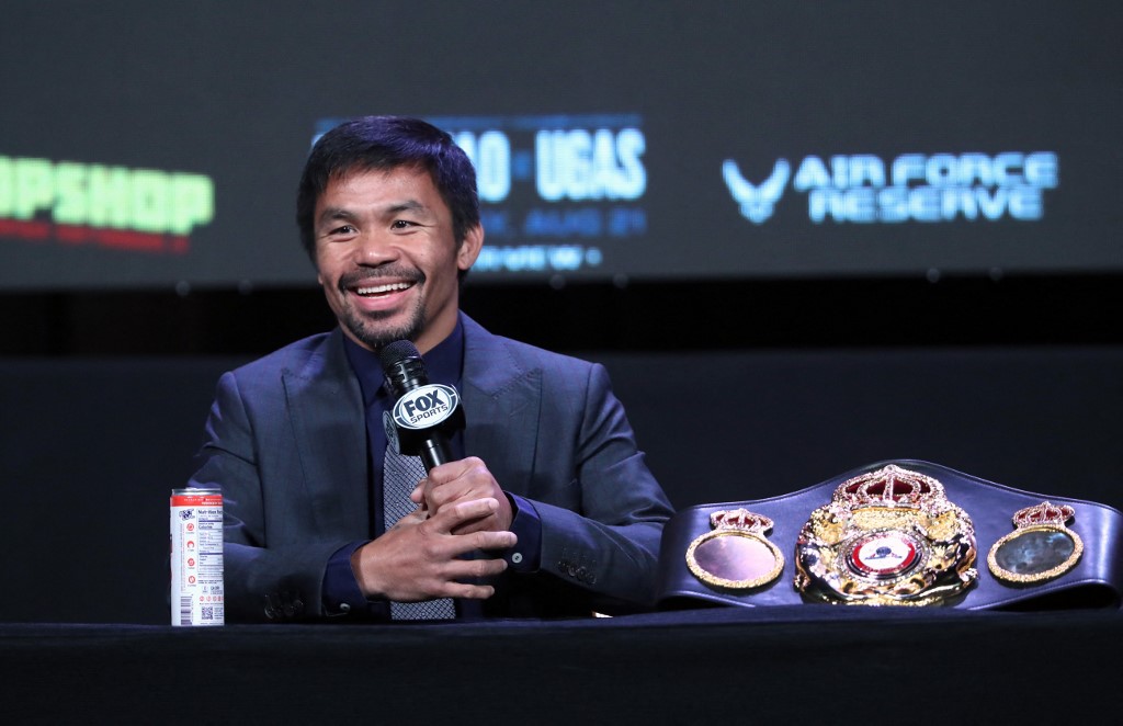  Manny Pacquiao speaks during a news conference at MGM Grand Garden Arena on August 18, 2021 in Las Vegas, Nevada. Pacquiao will challenge WBA welterweight champion Yordenis Ugas for his title at T-Mobile Arena on August 21 in Las Vegas. 