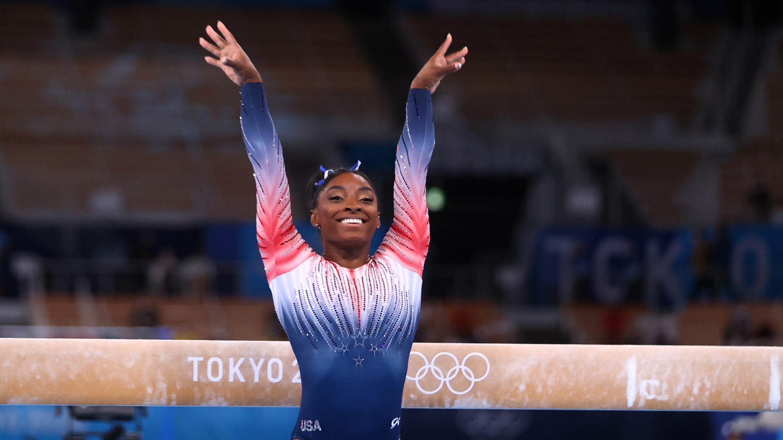 Simone Biles of the United States in action on the balance beam. 