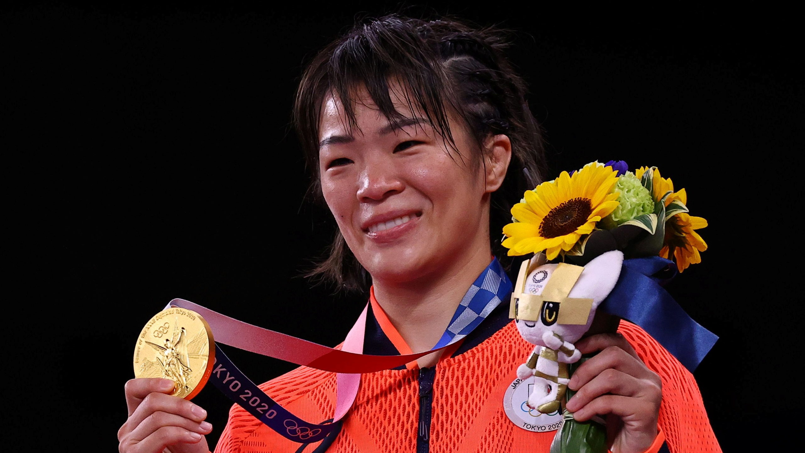 Gold medallist Risako Kawai of Japan poses with her medal. 