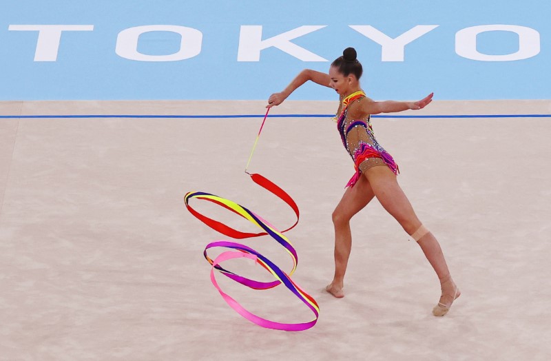 Anastasiia Salos of Belarus in action with ribbon 