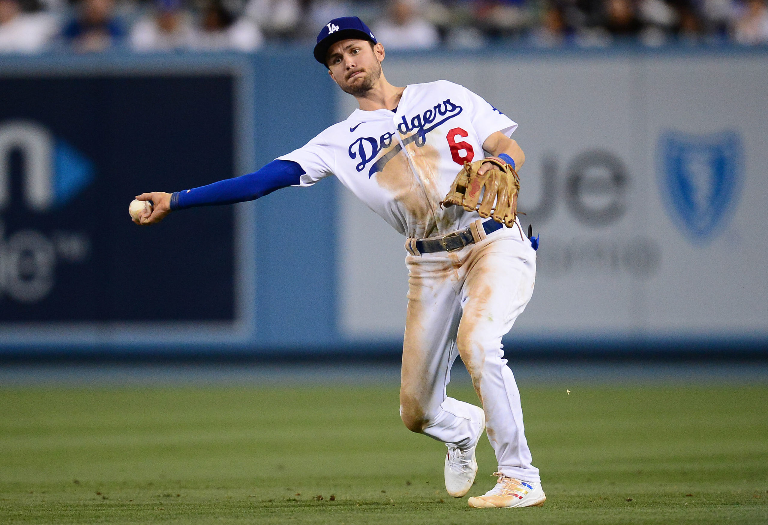 Los Angeles Dodgers second baseman Trea Turner (6) throws to first for the out against New York Mets center fielder Brandon Nimmo (9) during the eighth inning at Dodger Stadium