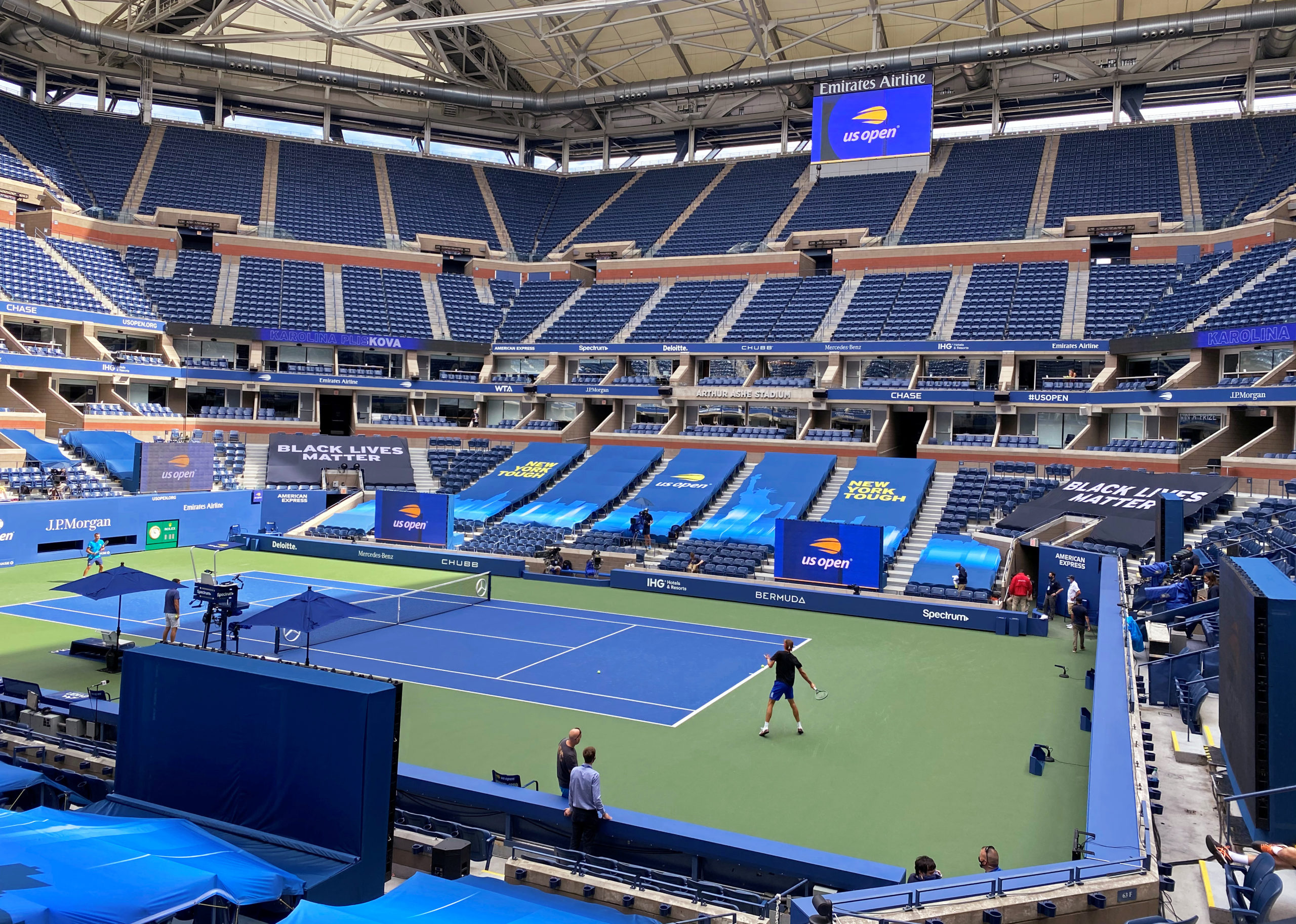 FILE PHOTO: Signage bearing the words "Black Lives Matter" is seen inside Arthur Ashe Stadium on day one of the U.S. Open tennis tournament in the Queens borough of New York City, U.S., August 31, 2020.