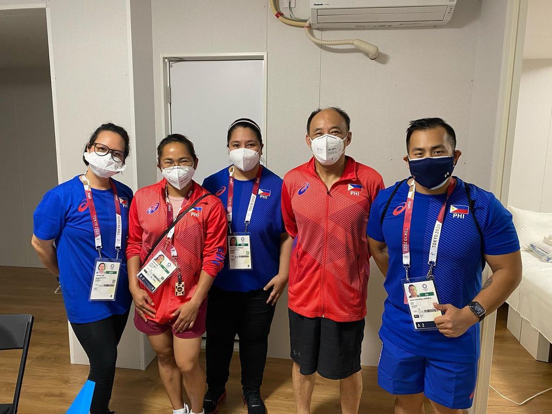 Hidilyn Diaz with her team inside the Olympic village.