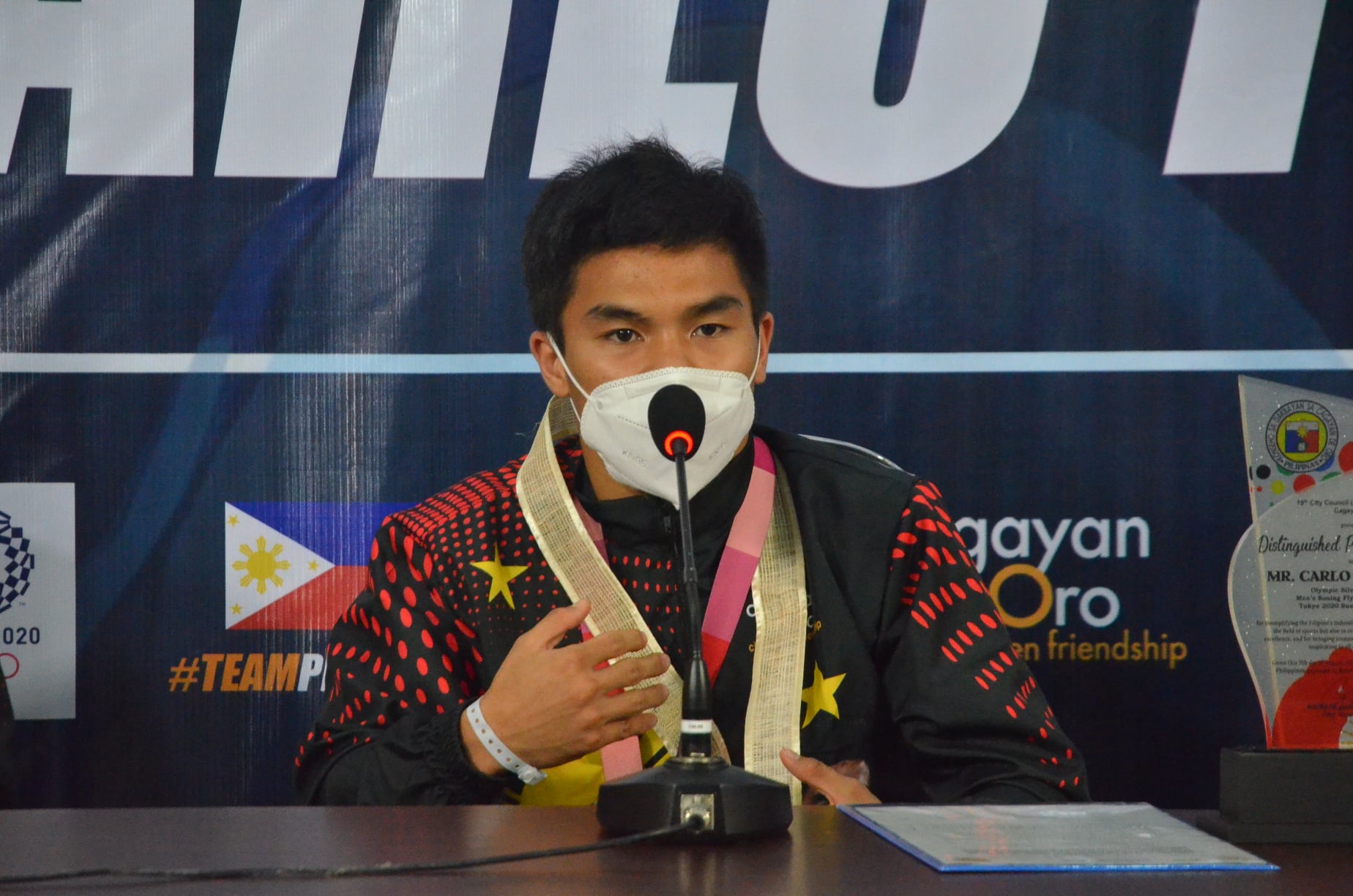 Carlo Paalam speaks to the media on his return to his hometown in Cagayan de Oro