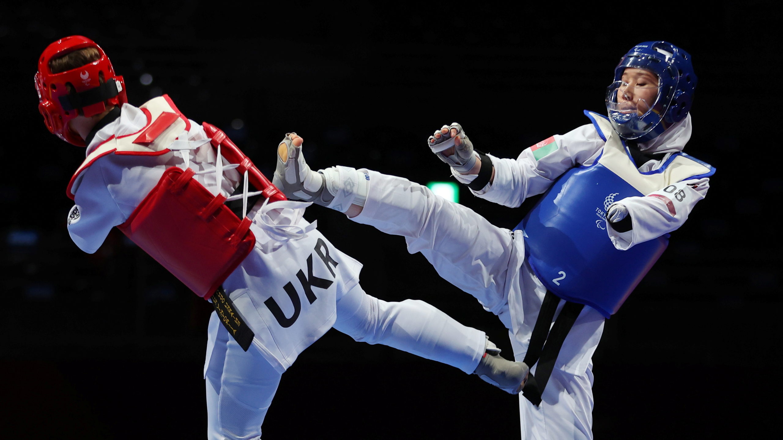 Zakia Khudadadi of Afghanistan in action during her bout against Viktoriia Marchuk of Ukraine 