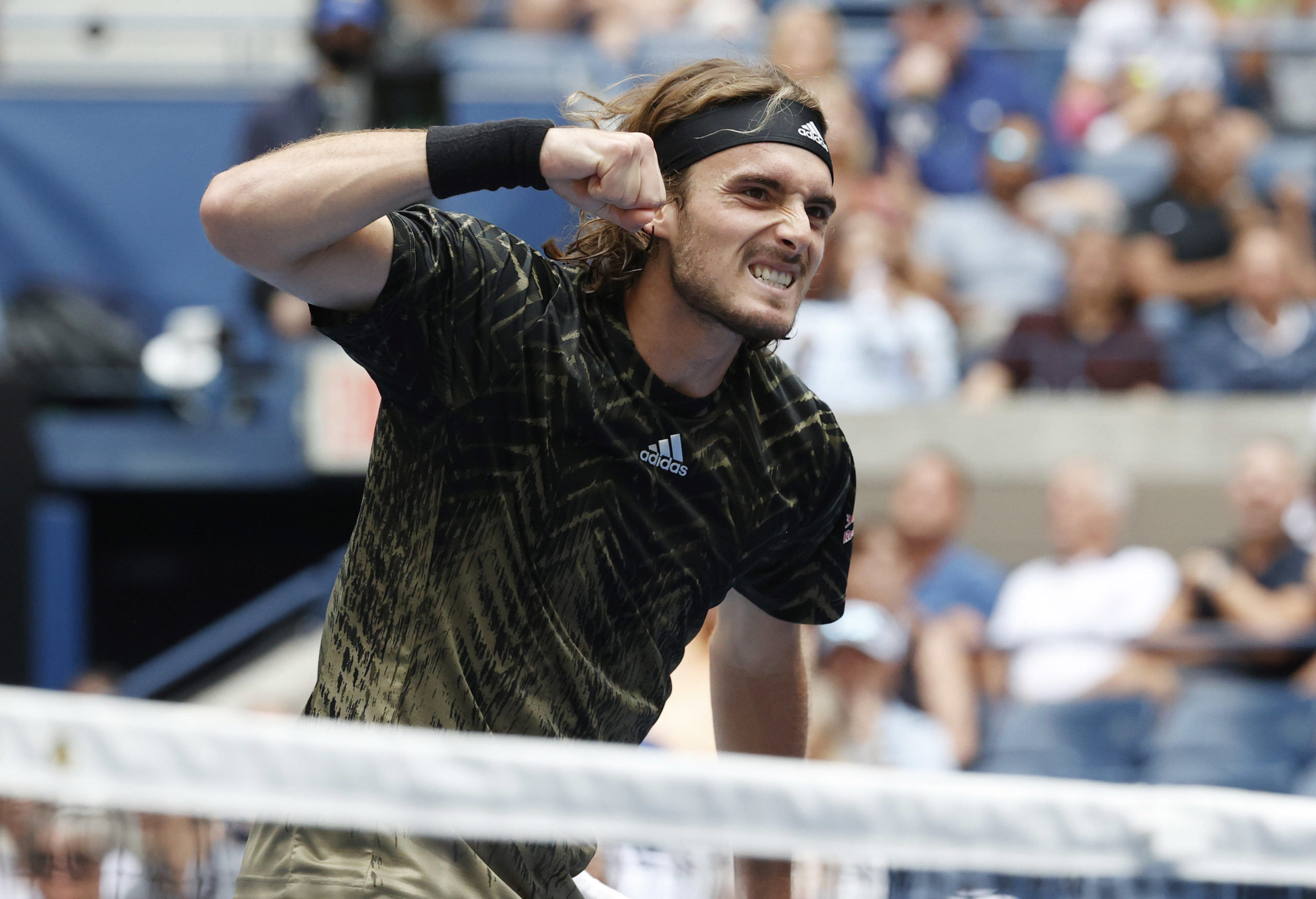  Stefanos Tsitsipas of Greece celebrates after winning a point against Carlos Alcaraz of Spain in a third round match on day five of the 2021 U.S. Open tennis tournament at USTA Billie Jean King National Tennis Center