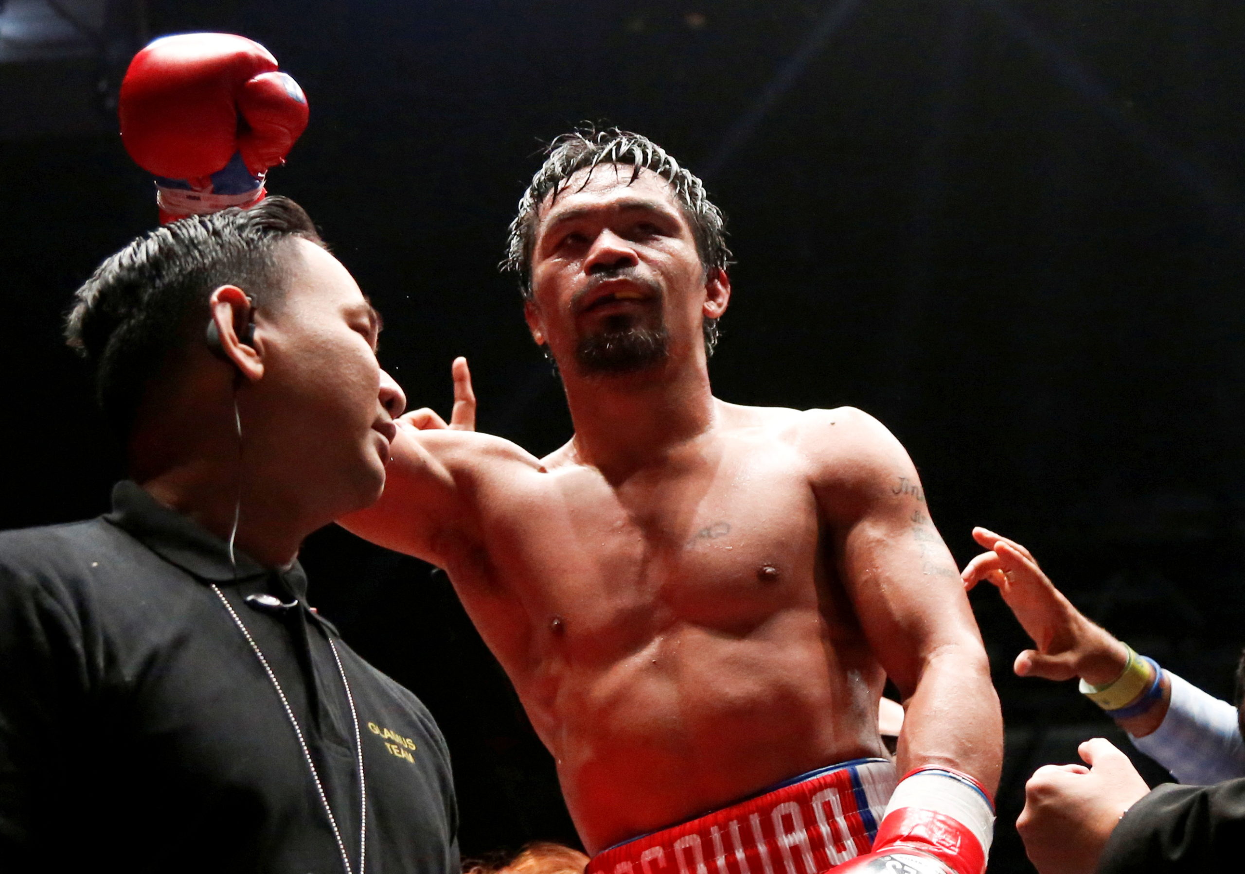 boxing legend Manny Pacquiao celebrates after winning the bout against Lucas Matthysse. Picture taken July 15, 2018.