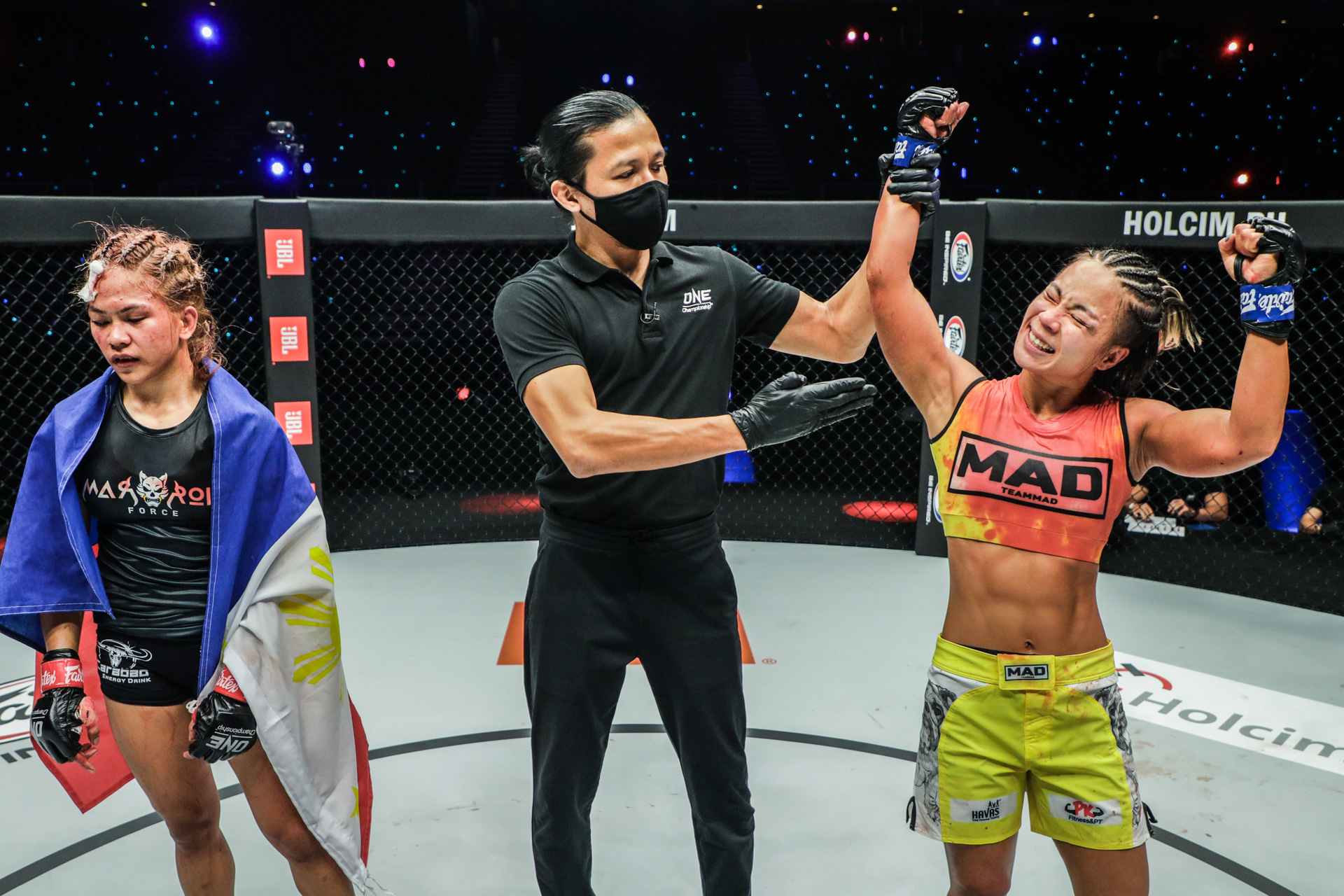 Denice Zamboanga (left) after the split decision victory for Ham Seo-Hee was announced in the ONE Atomweight Grand Prix. 