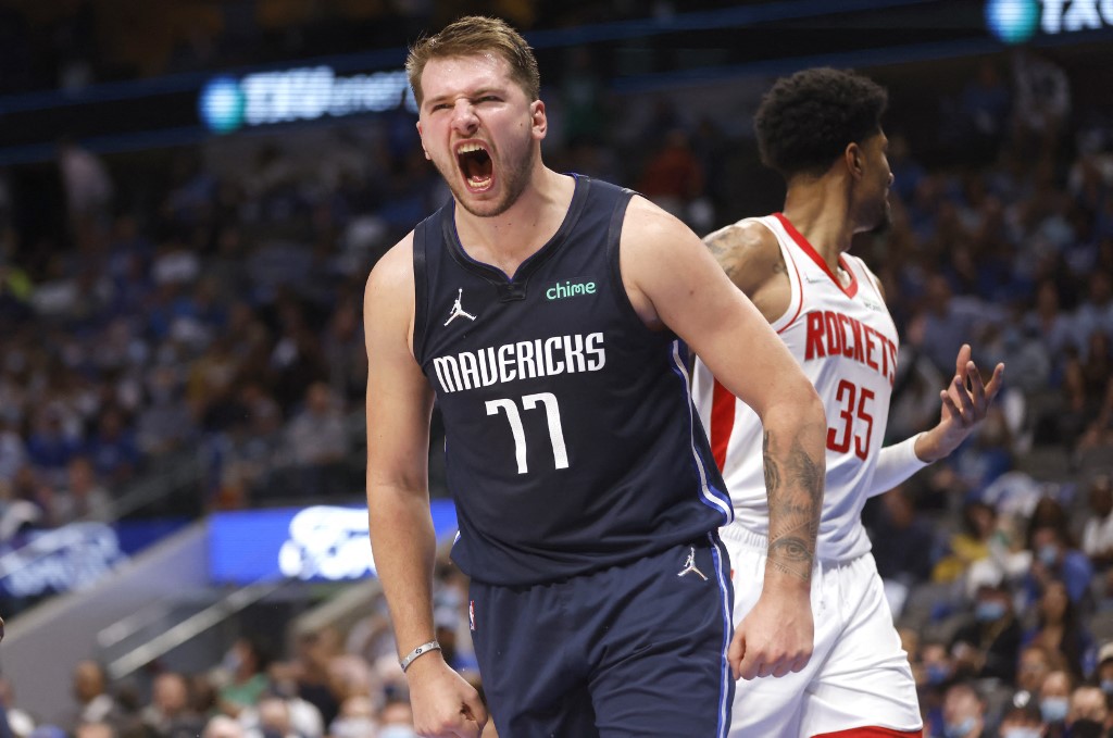  Luka Doncic #77 of the Dallas Mavericks reacts after scoring a basket against the Houston Rockets in the second half at American Airlines Center on October 26, 2021 in Dallas, Texas