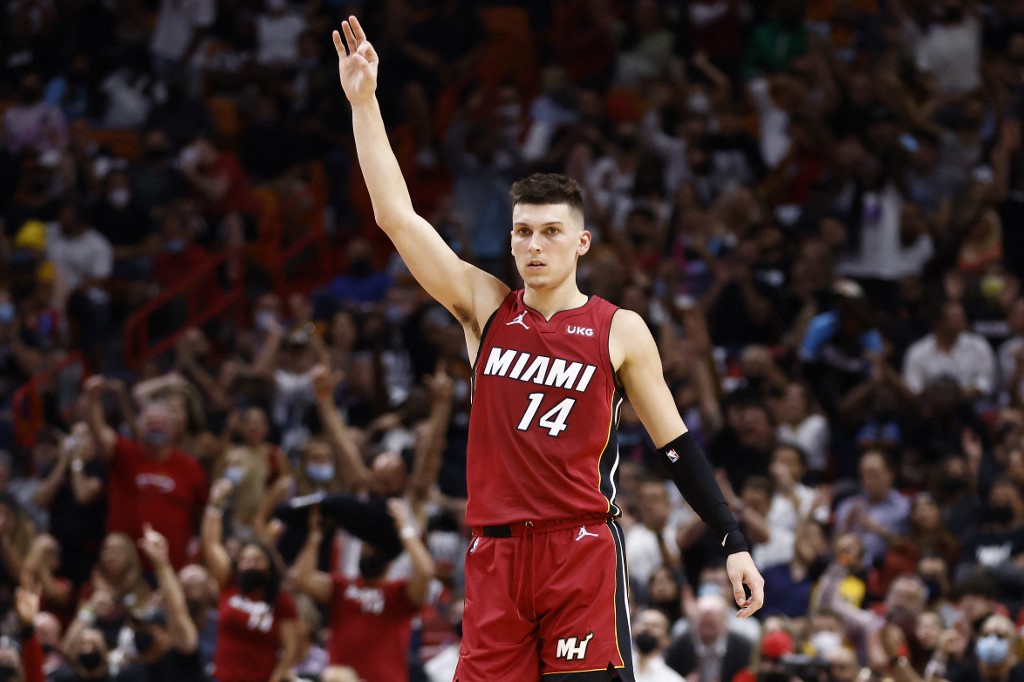 Tyler Herro #14 of the Miami Heat celebrates a three pointer against the Milwaukee Bucks during the first half at FTX Arena on October 21, 2021 in Miami, Florida. Michael Reaves/Getty Images/AFP 