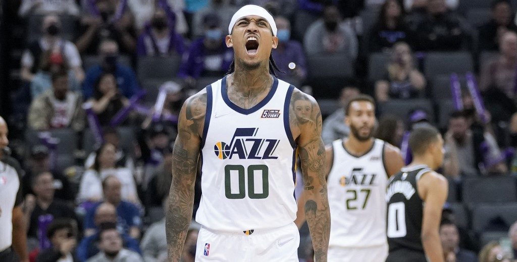 Jordan Clarkson #00 of the Utah Jazz reacts after he made a three-point shot against the Sacramento Kings during the third quarter at Golden 1 Center on October 22, 2021 in Sacramento, California. 