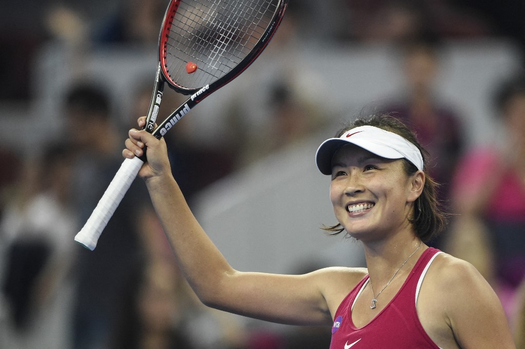 (FILES) This file photo taken on October 3, 2016 shows China's Peng Shuai reacting after beating Venus Williams of the US in their women's singles first round match at the China Open tennis tournament in Beijing. - Peng, one of China's top tennis stars, has accused a top Beijing politician, former vice premier Zhang Gaoli, of forcing her into sex and posted details of a relationship between the two in explosive allegations that censors have raced to scrub from social media.